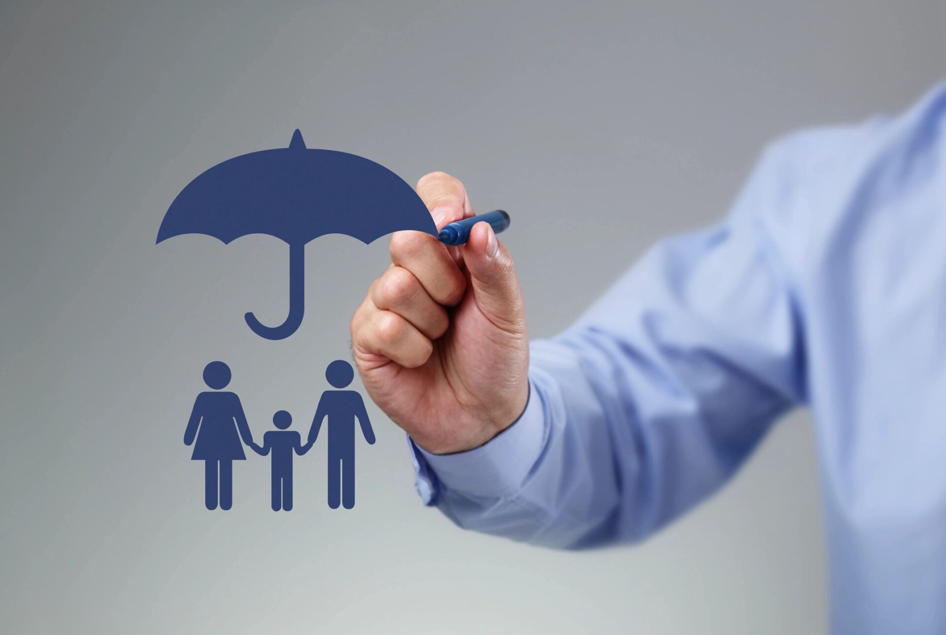 a person drawing an umbrella above three people