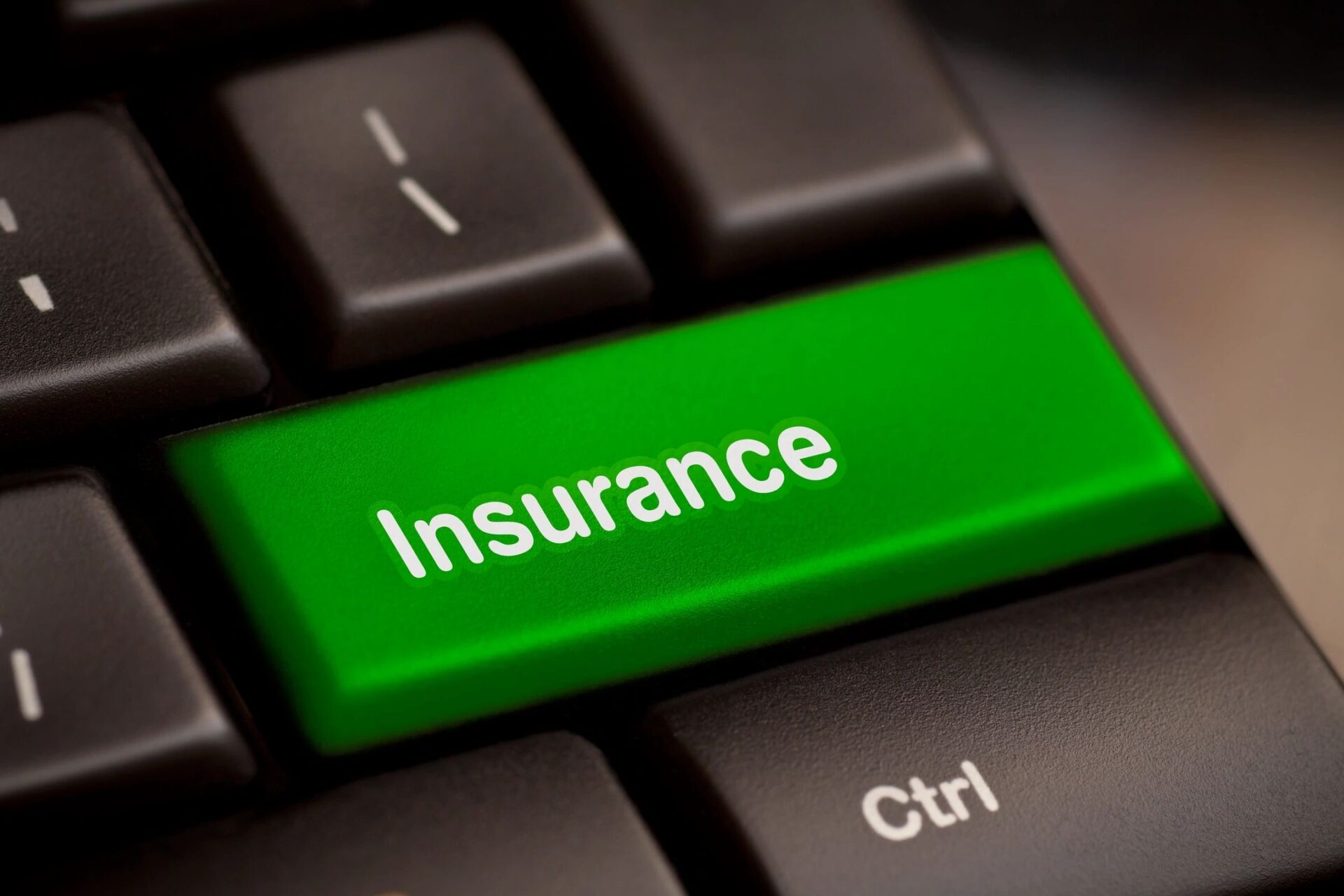 a green keyboard button named insurance