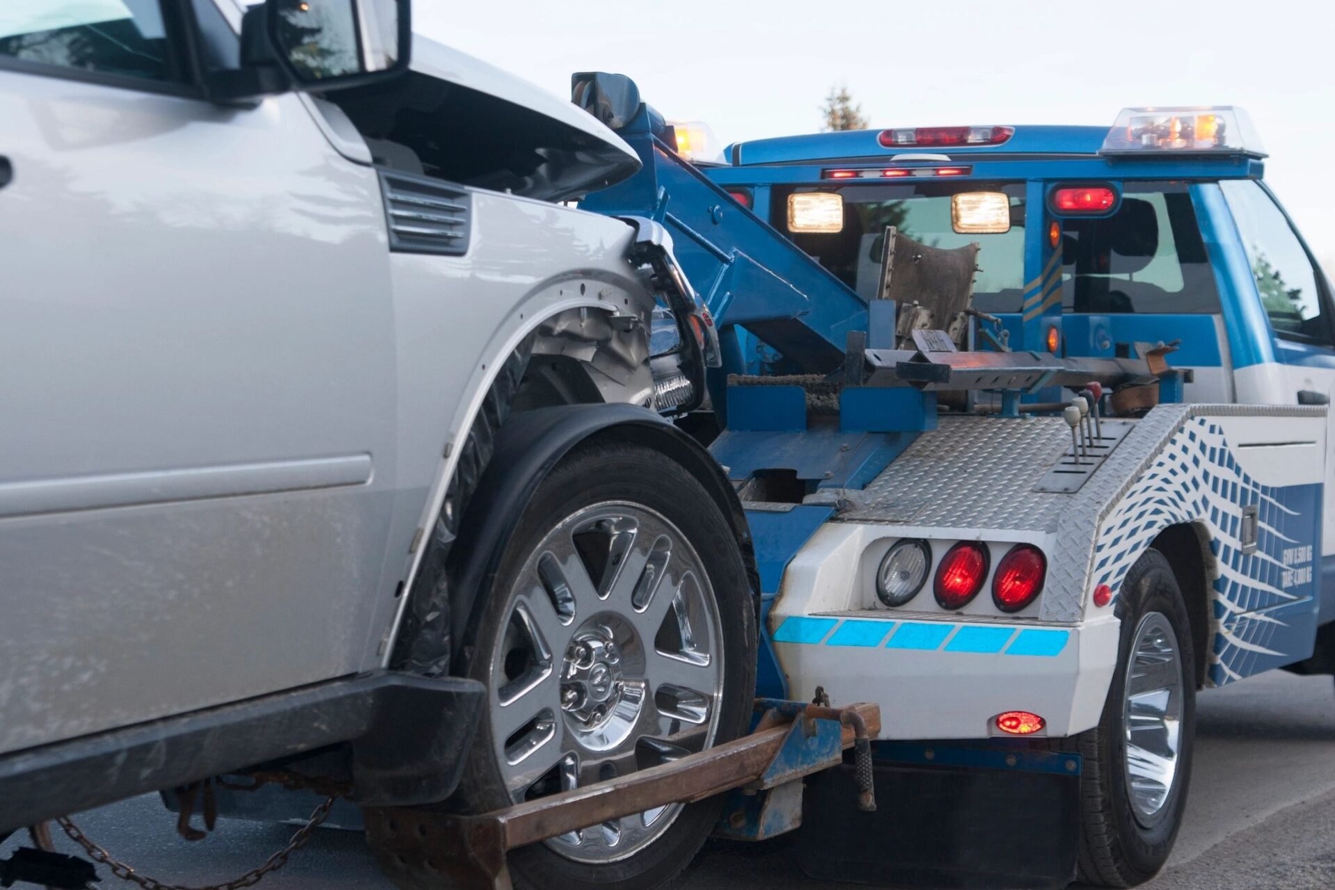 a truck towing a car